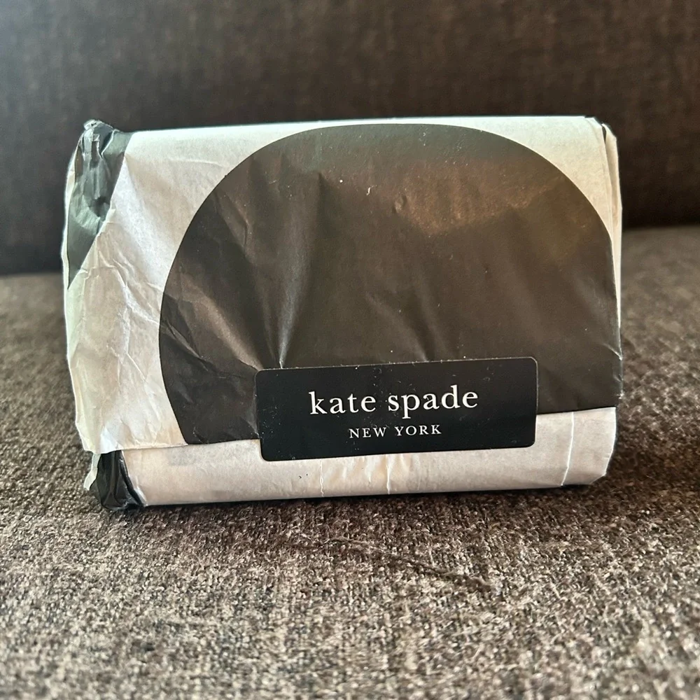 NWT- Kate Spade L- Zip White wallet. In wrapper.